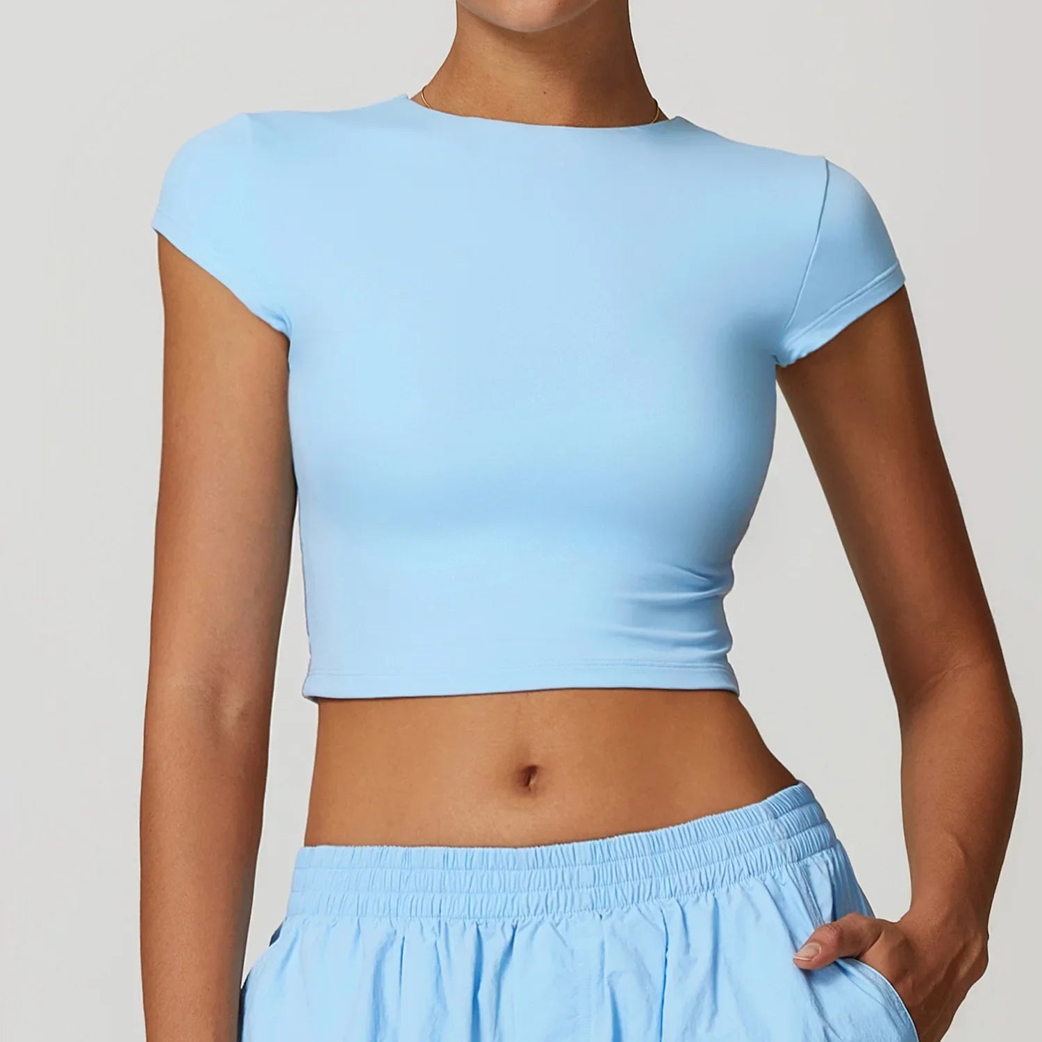 T-shirt Sport Crop Top - bleu clair / S